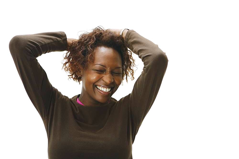 Portrait of African woman with hands in hair