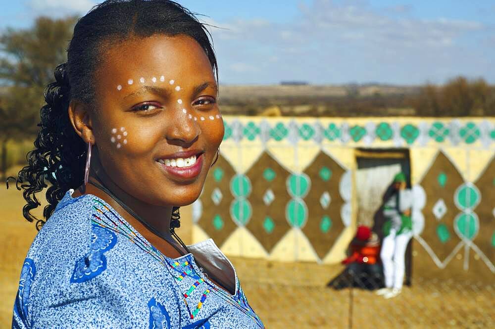 African woman with paint on face