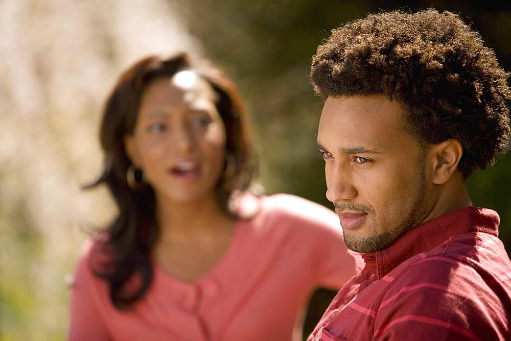 African American man ignoring girlfriend