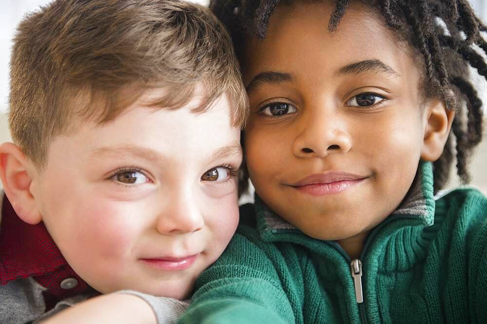 Close up of smiling boys taking selfie