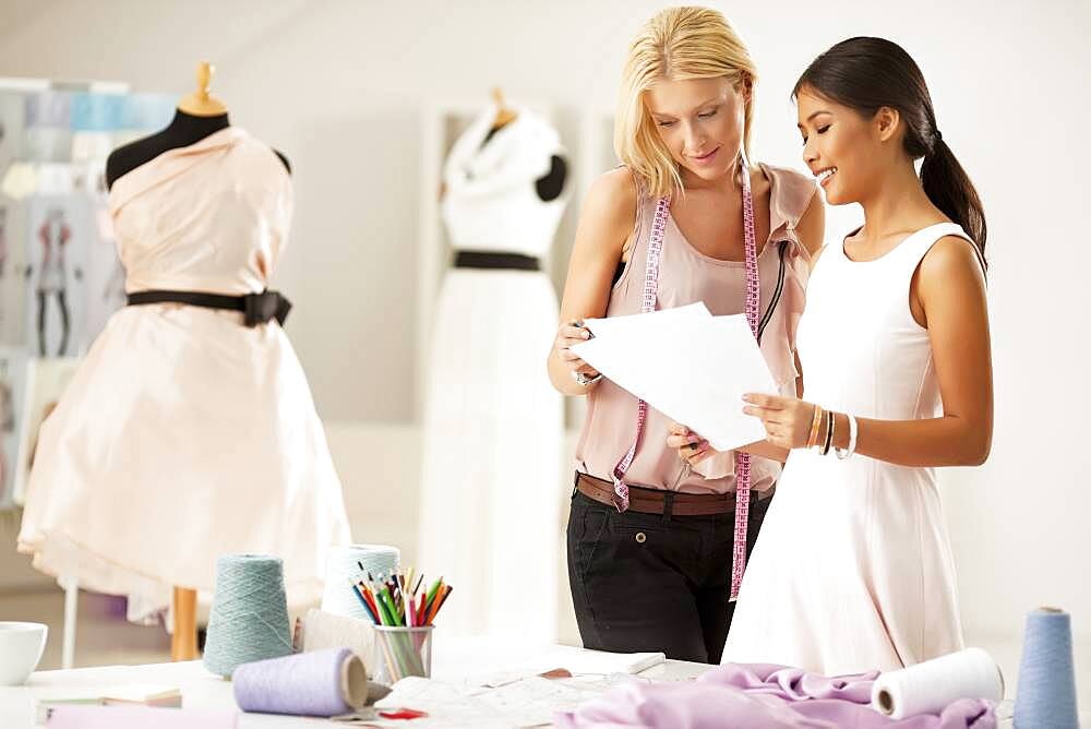 Fashion designers working together in studio