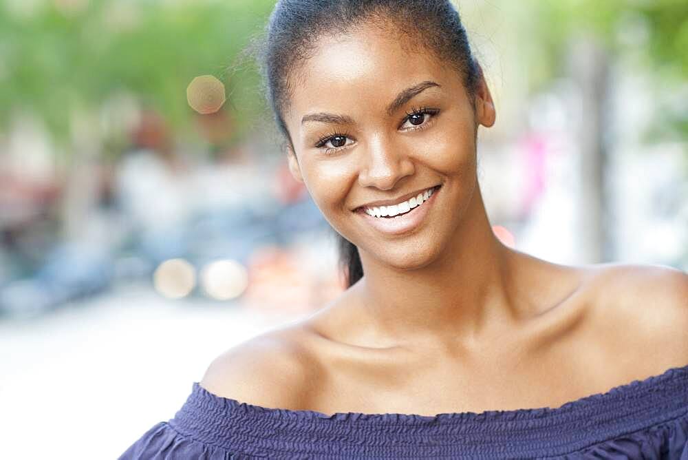 Close up of Black woman smiling outdoors