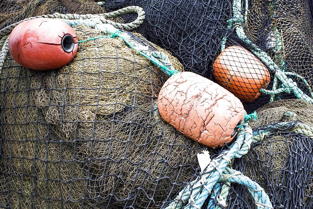 Close up of fishing net and buoys