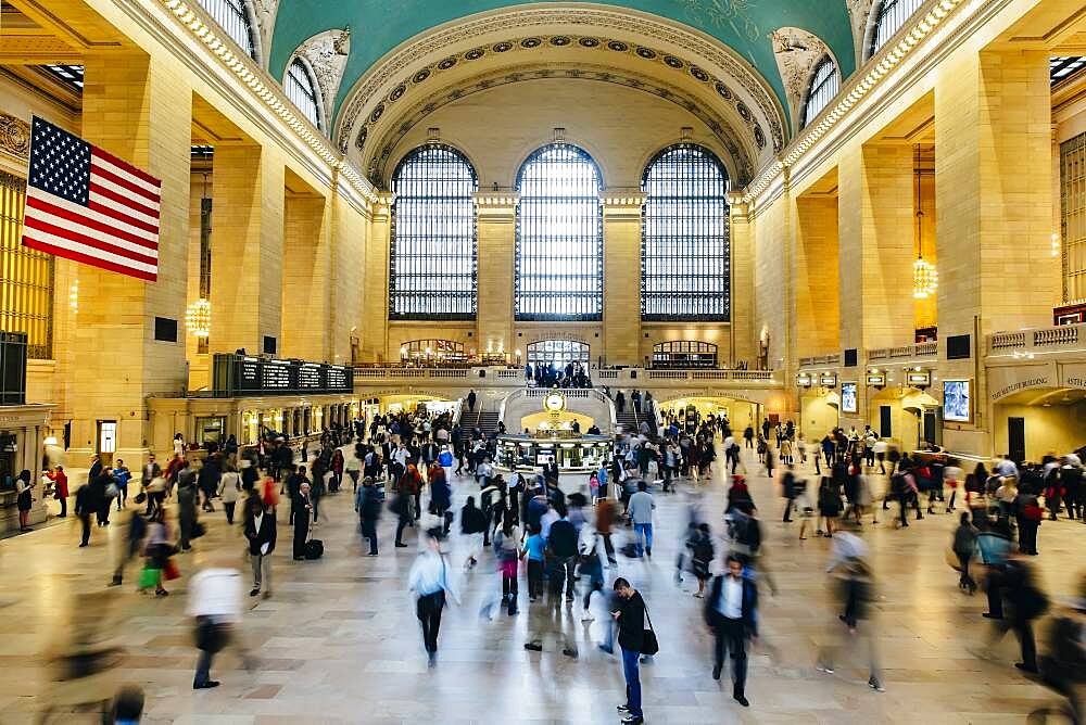 Blurred view of people in train station, New York, New York, United States