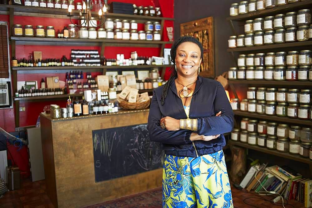 Black woman smiling in tea shop