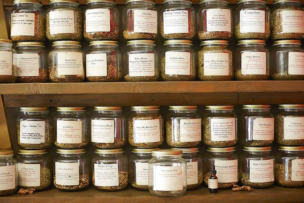 Jars of variety of teas in tea shop