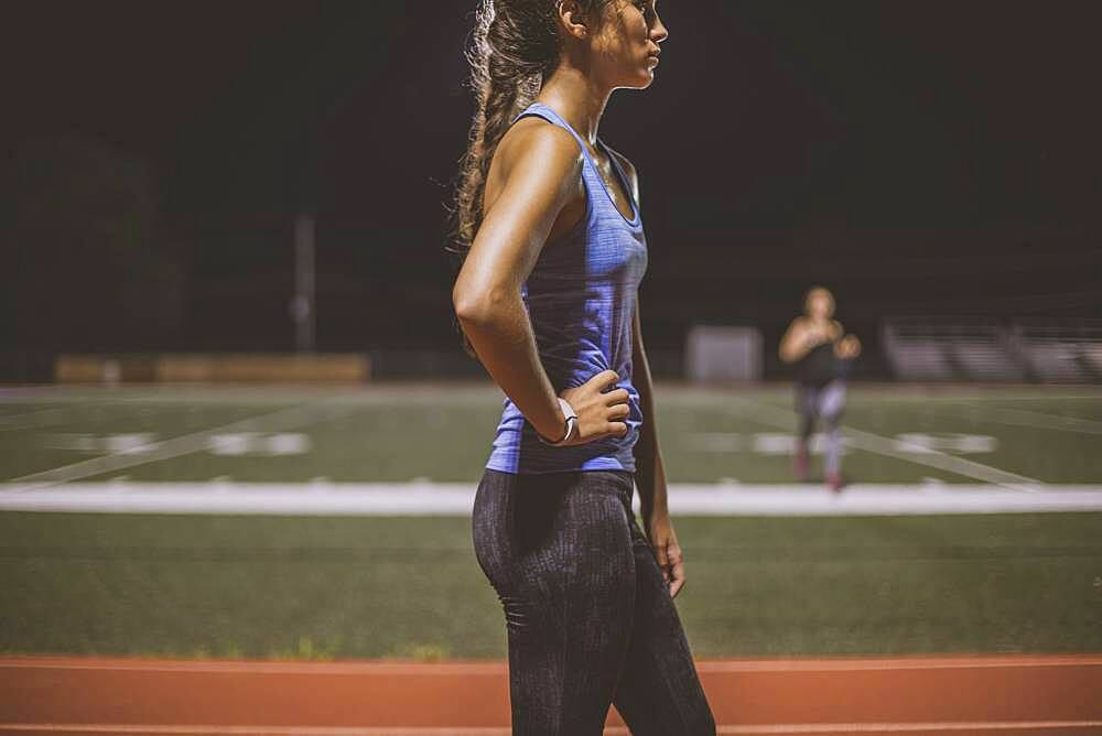 Athlete resting on sports field