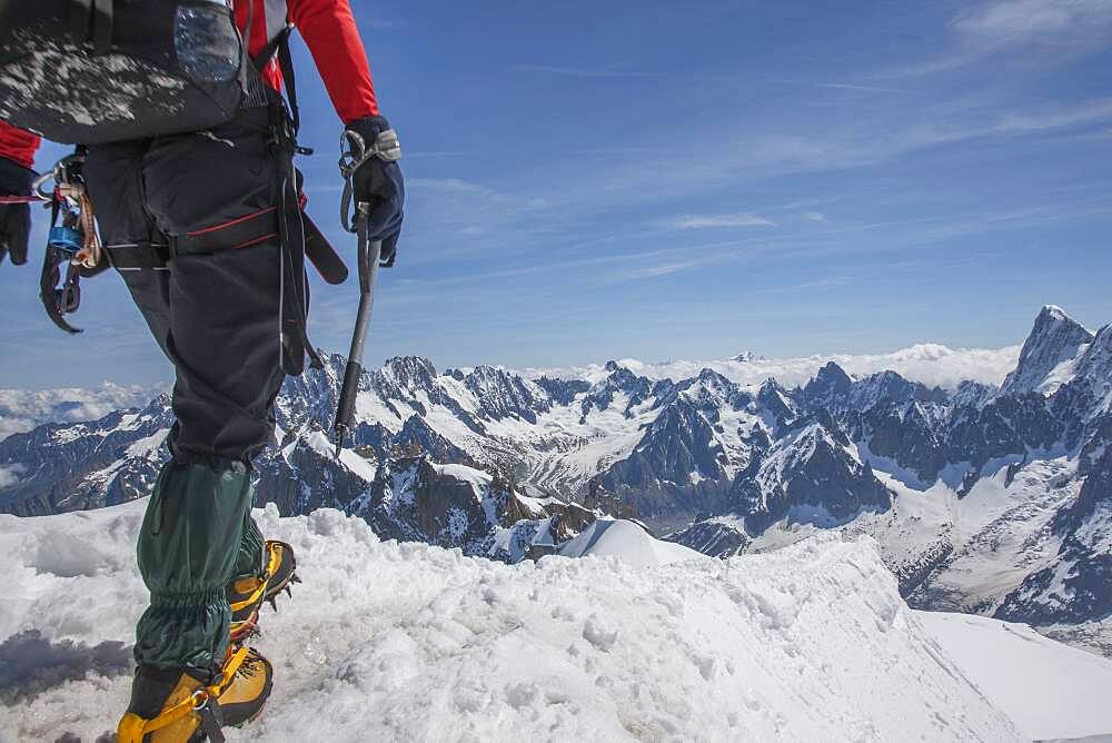 Caucasian hiker on mountaintop, Mont Blanc, Chamonix, France