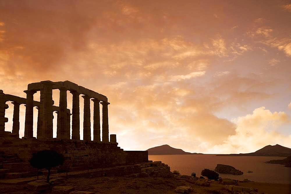 Temple of Poseidon under sunset sky, Cap Sunion, Greece