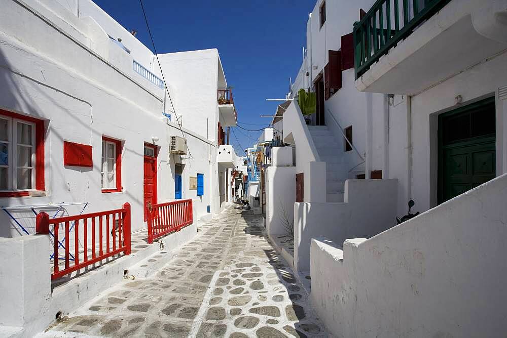 Traditional buildings on Mykonos street, Cyclades Islands, Greece