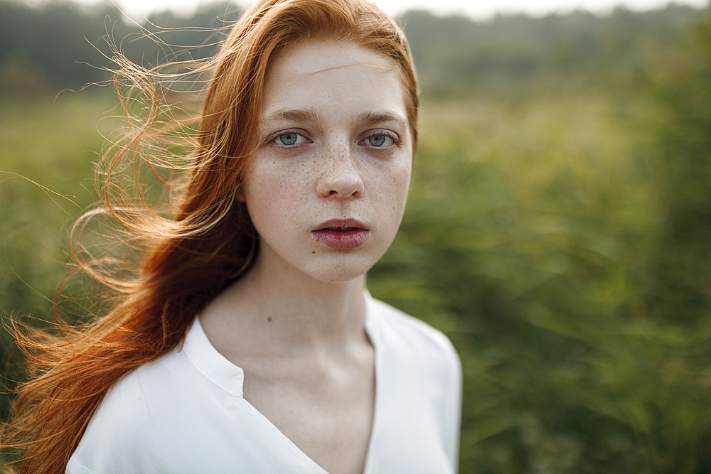 Close up of wind blowing hair of Caucasian woman