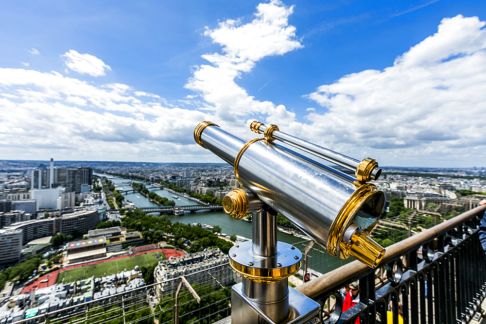 Telescope at scenic view of river in city, Paris, Ile de France, France