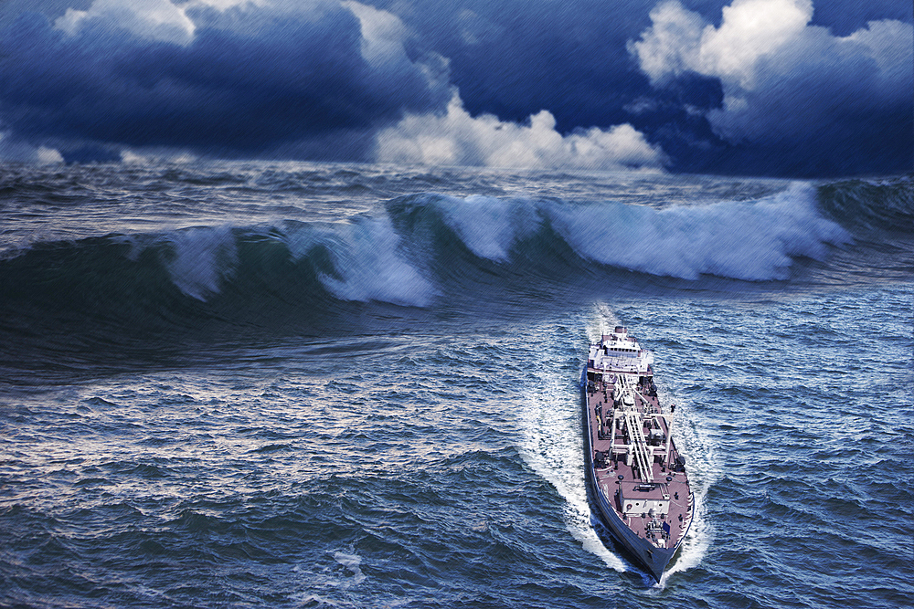 Enormous waves behind freighter