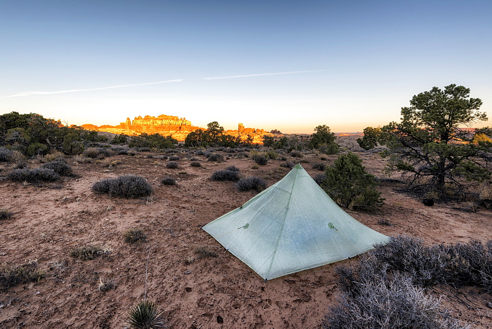 Tent in desert at sunset, Moab, Utah, United States