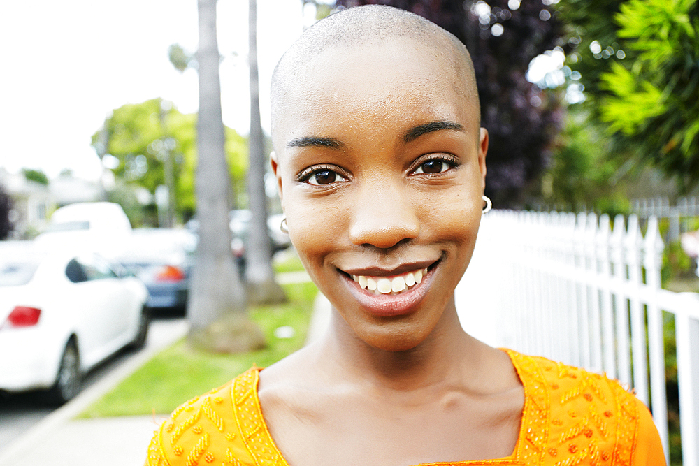 Portrait of bald smiling Black woman