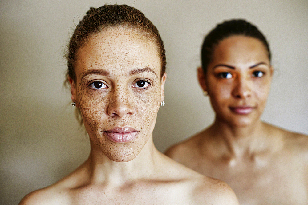 Close up of serious mixed race women