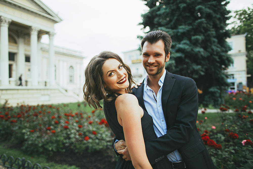 Portrait of smiling Caucasian couple hugging