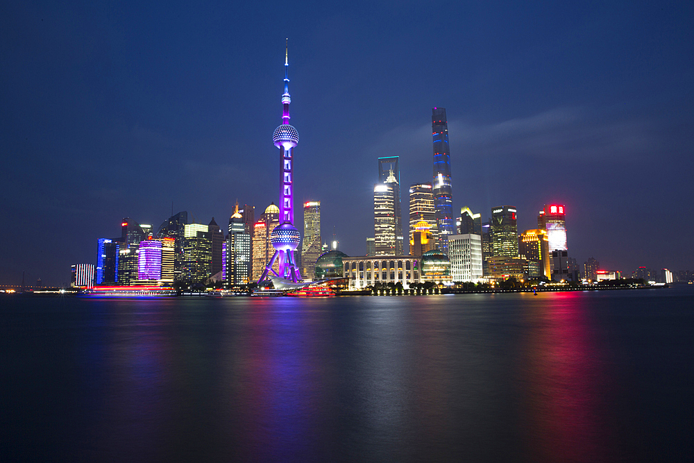 Illuminated city waterfront, Beijing, China