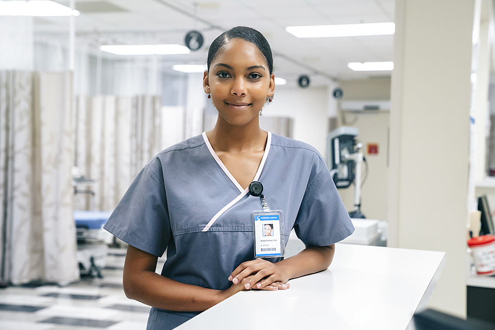 Portrait of smiling African American nurse in hospital