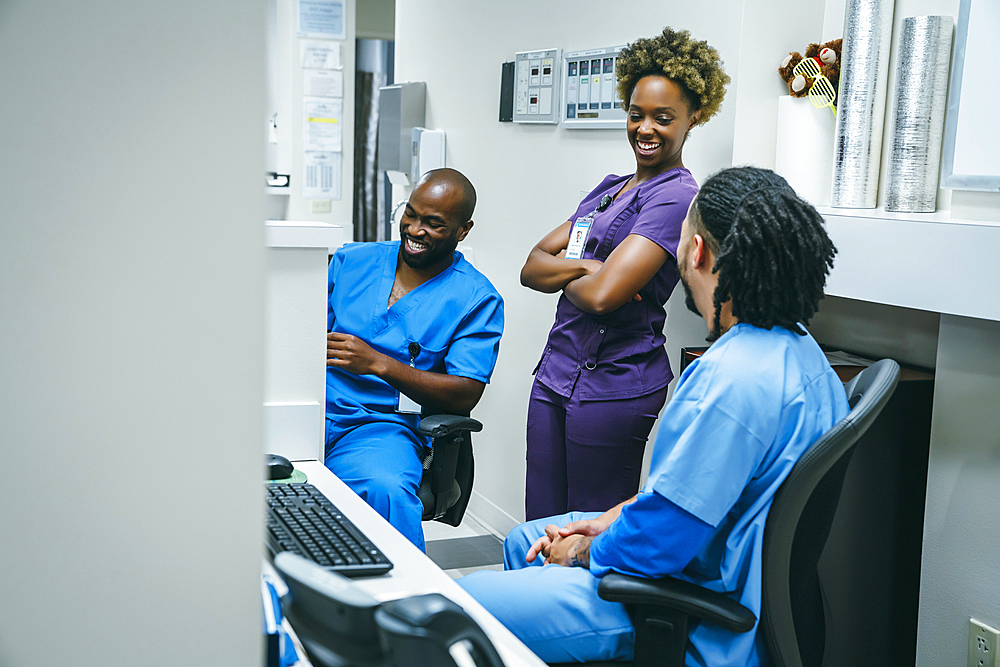 Nurses laughing in hospital