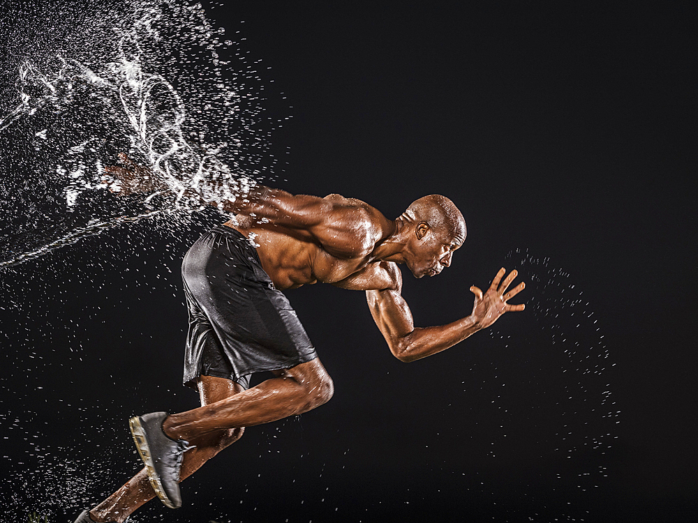 Water splashing on black runner