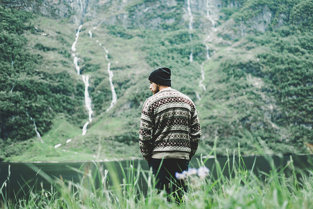 Caucasian man admiring scenic view of river