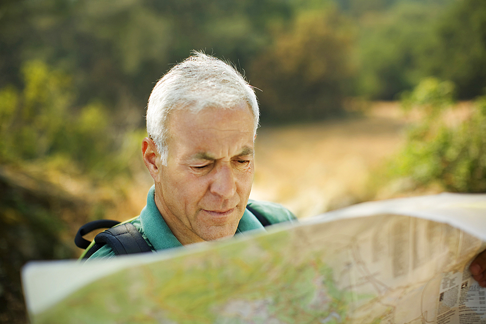 Caucasian man reading map