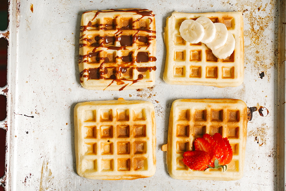 Variety of waffles on pan