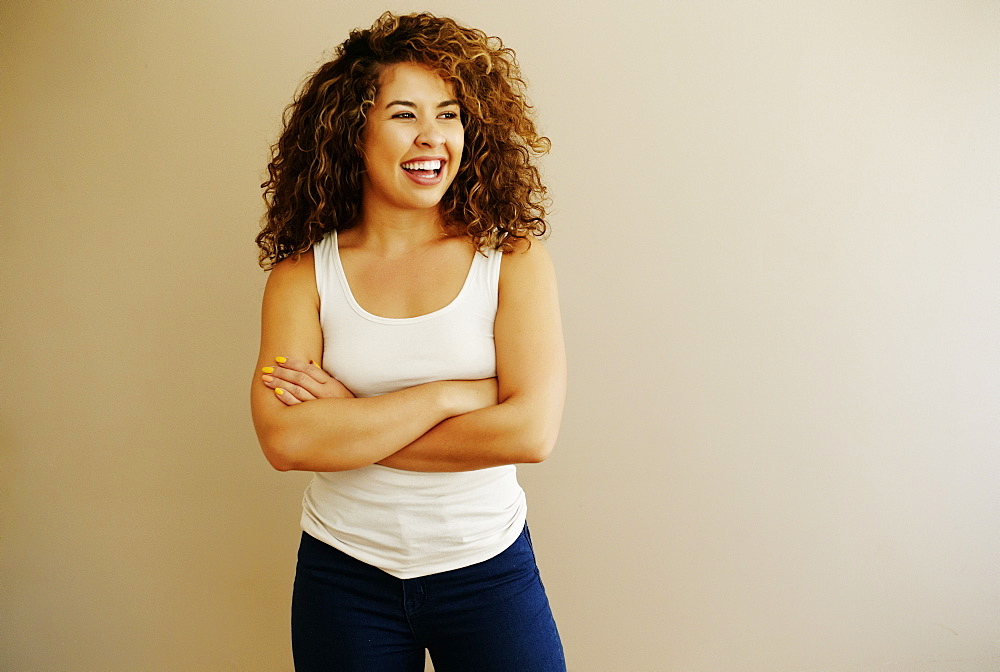 Portrait of laughing Mixed Race woman