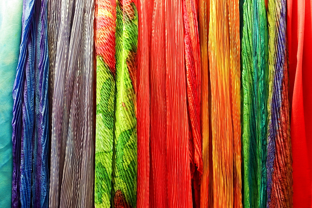 Row of multicolor scarves