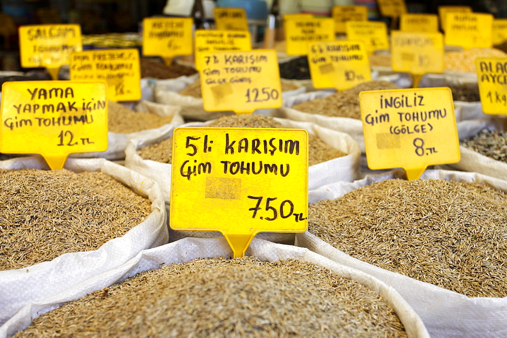 Spices in sacks with prices at market