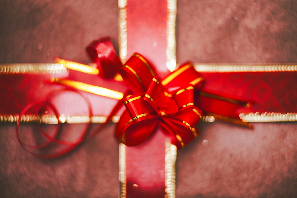 Close up of red bow on Christmas gift