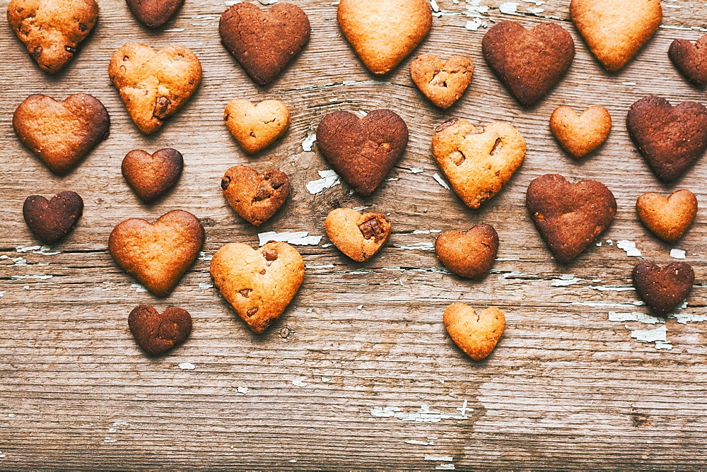 Heart-shape cookies on wooden table