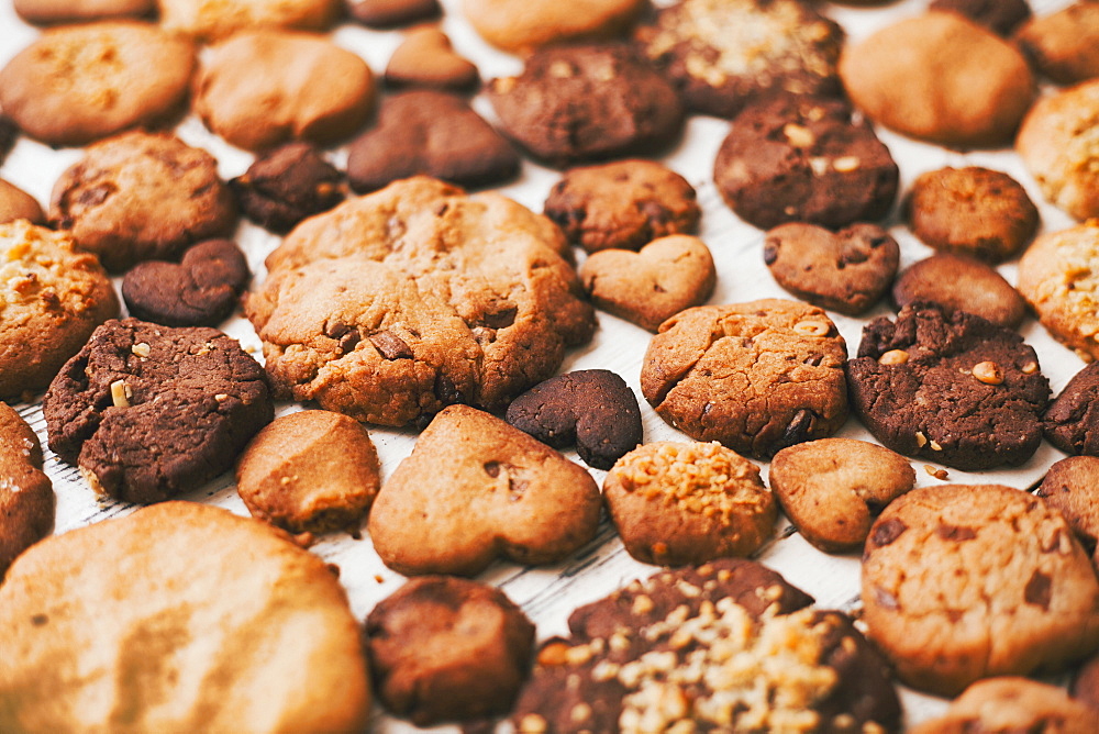 Variety of cookies on wooden table