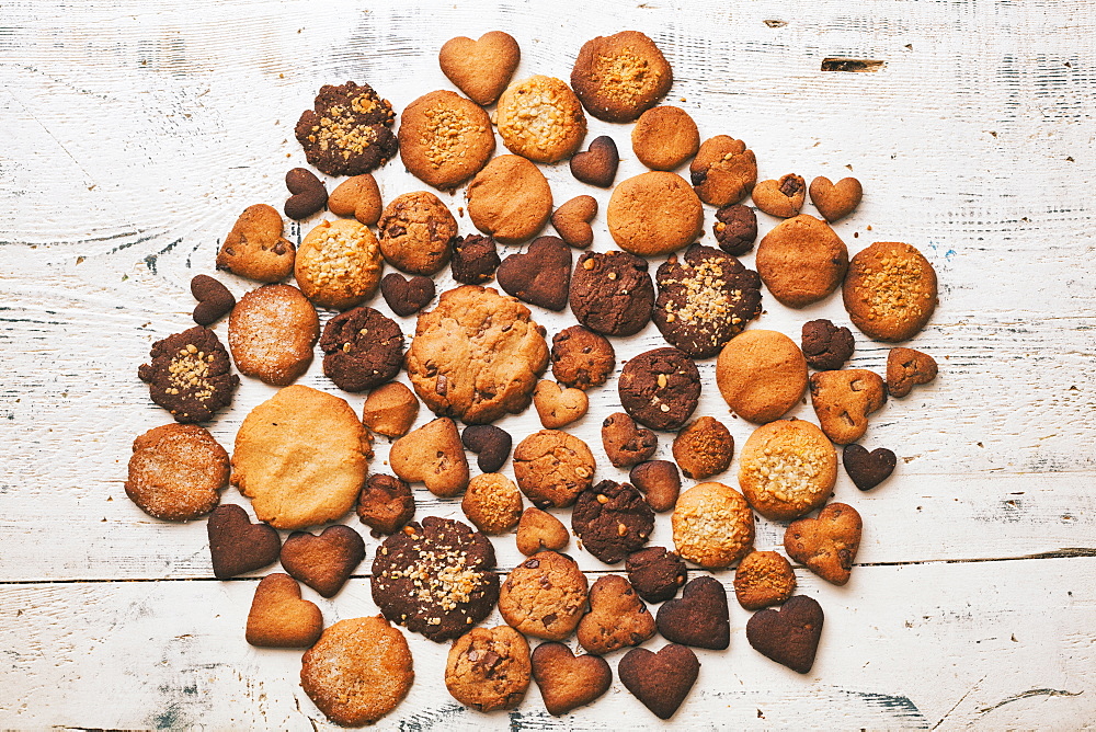 Variety of cookies on wooden table