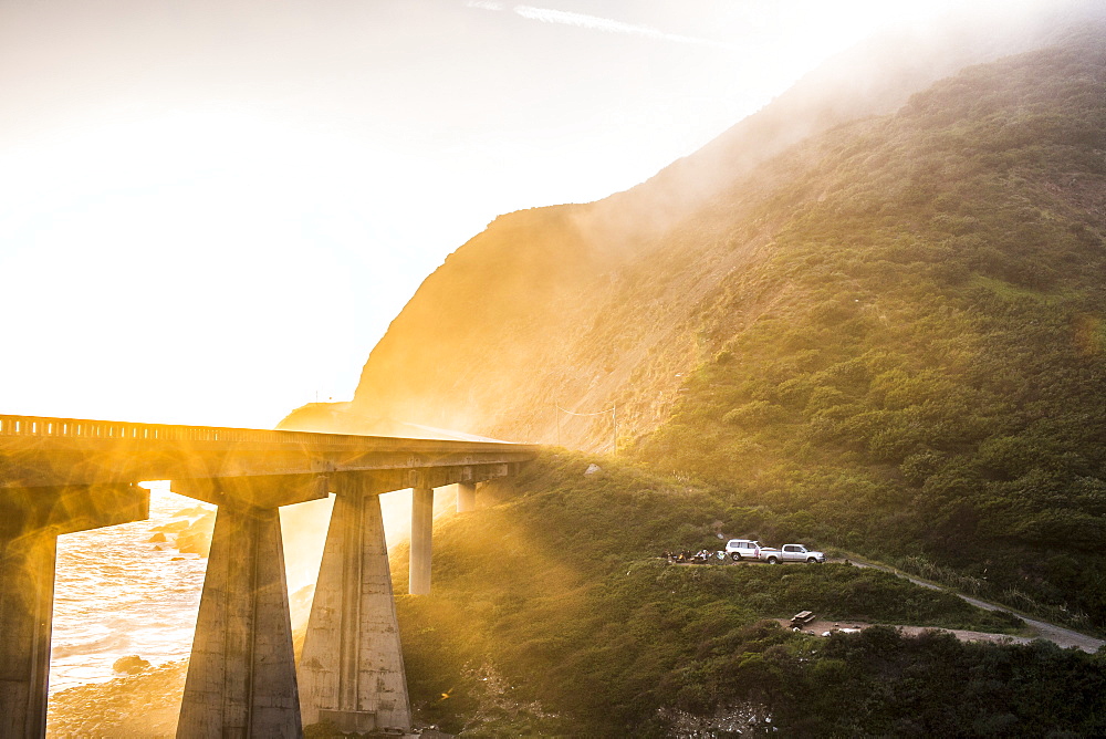 Fog on bridge near ocean