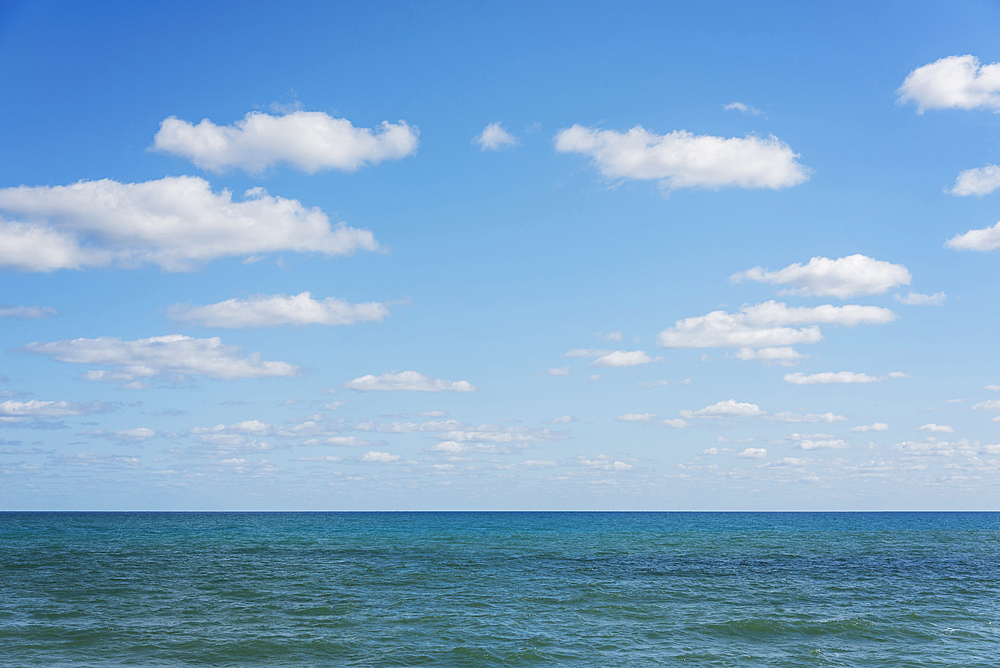 Ocean seascape under blue sky