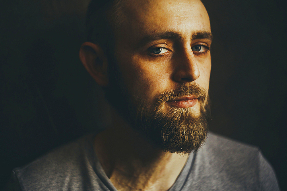 Portrait of serious Caucasian man with beard