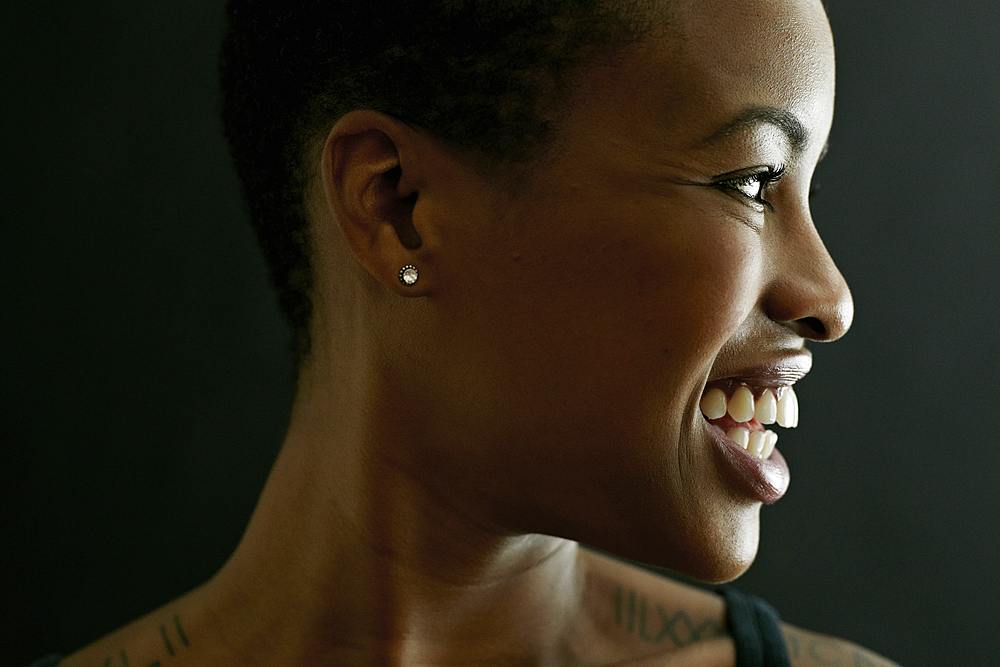 Profile of smiling Black woman