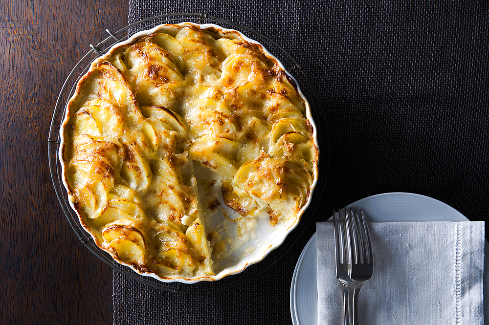 Potato pie on table