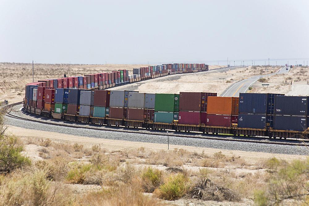 Cargo containers on curving railroad track