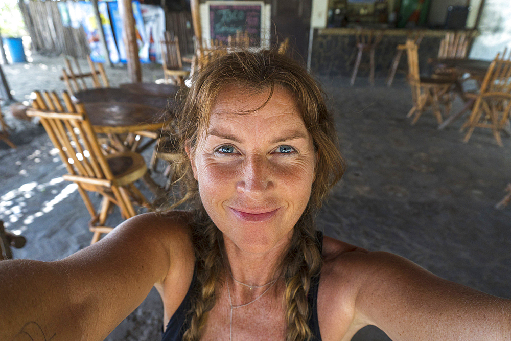 Smiling Caucasian woman posing for self-portrait