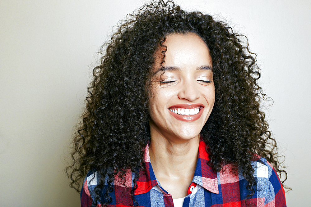 Hispanic woman laughing