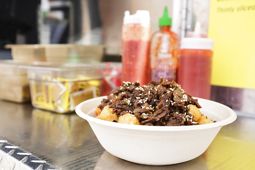 Bowl of food on shelf of food truck