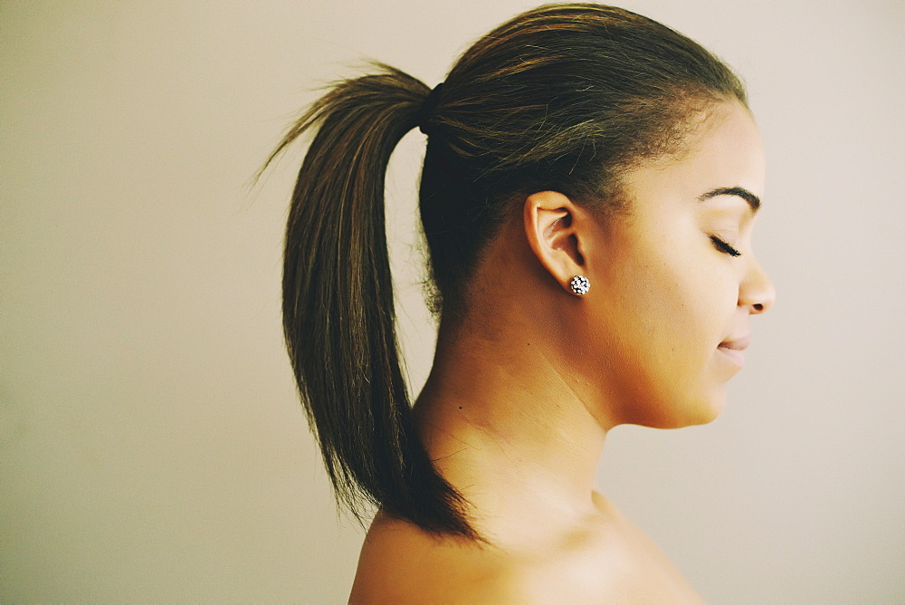 Profile of Mixed Race woman with eyes closed