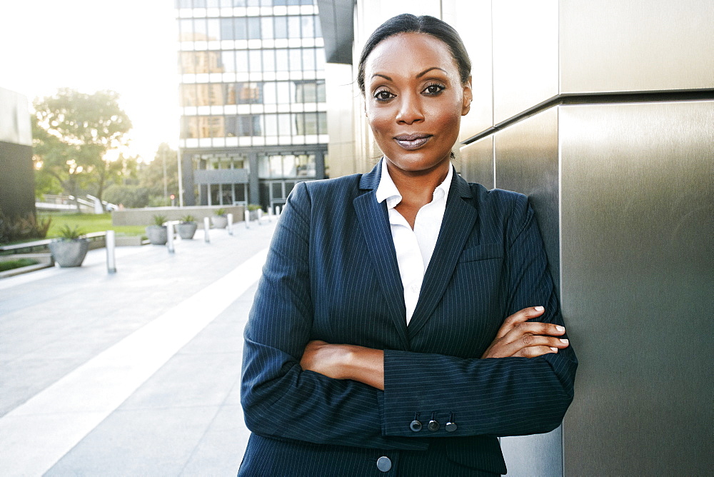 Black businesswoman smiling outdoors