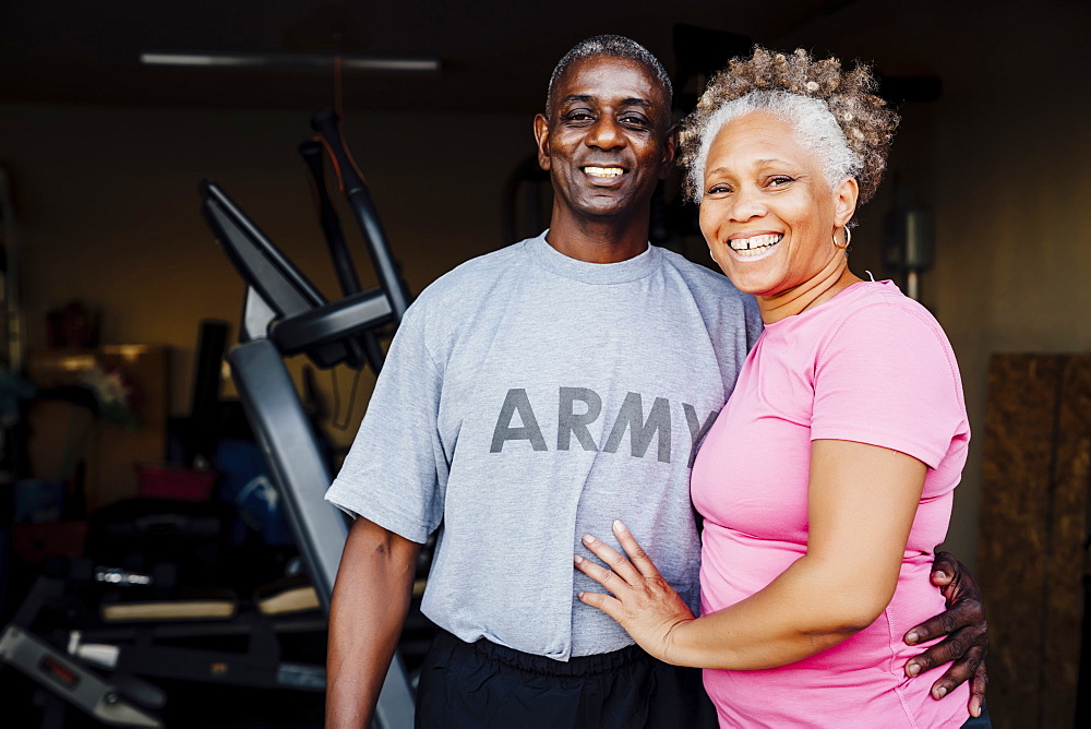 Black woman smiling in garage