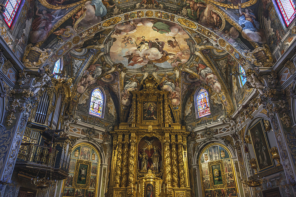 Spain, Valencia, Ornate altar and frescos in Co-cathedral of Saint Nicholas of Bari