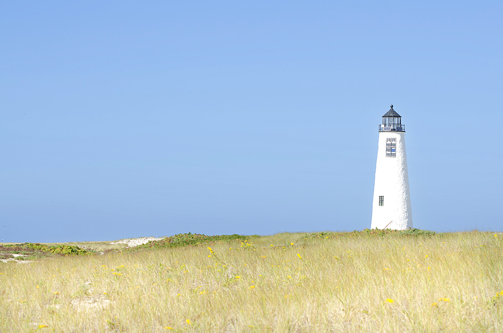 Lighthouse at Great Point against clear blue sky