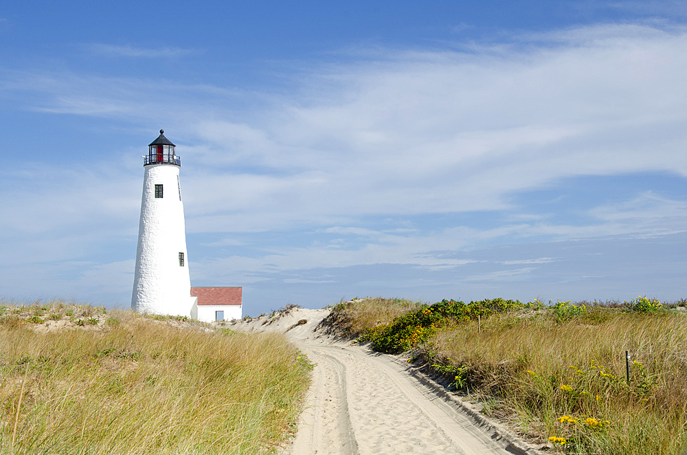 Lighthouse at Great Point against blue sky